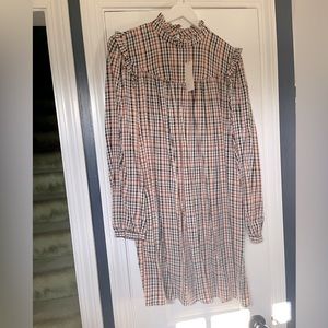 A New Day NWT plaid checkered dress in brown/black tones. Ruffle details-pockets